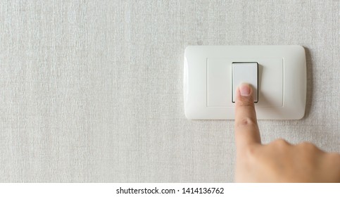 Concept save energy. Hand turning off switch