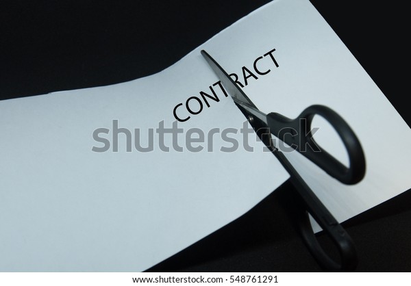 Concept, Scissor\
cutting the word\
CONTRACT