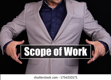 Concept Scope Of Work. Man Holding An Icon With A Message Text Written On It.