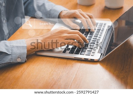 Concept of search engine and SEO optimization. Experience data search technology using mobile and laptop devices with search bar interface for discovering information online.