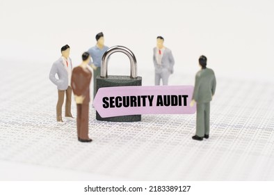 The Concept Of Security In Business. There Are Figures Of People On Business Reports, A Padlock With A Sticker On Which It Is Written - Security Audit