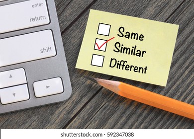 concept of similar, with desk background  - Shutterstock ID 592347038