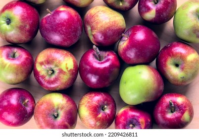 Concept For An Simple Autumn Background. Close-up Of Fresh, Organic Apples On A Wooden Table. Flat Lay, Top View. 