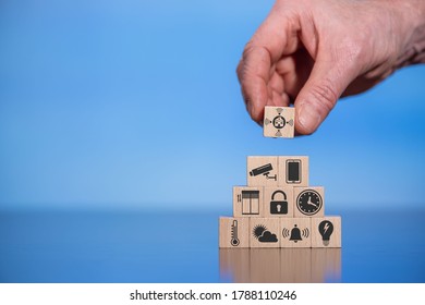 Concept of smart home with icons on wooden cubes - Shutterstock ID 1788110246