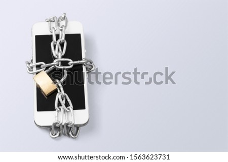 Concept of smartphone addiction/Abusing your mobile phone creates a real addiction called nomophobia, a fear of being disconnected  from the world