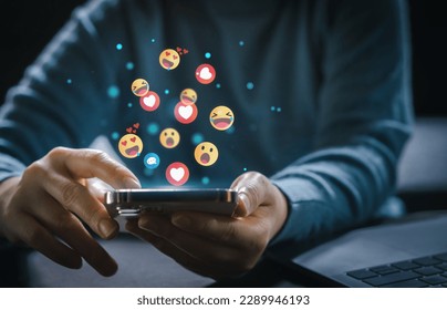 Concept of social media communication and digital online, people use smartphone playing with icon online social media, online marketing, technology, chat, post, like, follow at phone screen - Shutterstock ID 2289946193