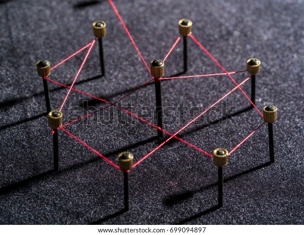 Stock image of linked pins to suggest social networking, distancing and virus tracking and control