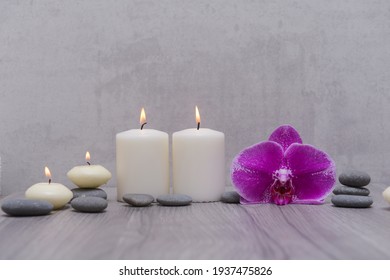 Concept for spa salon,with pink orchid.,with candle ,stone on wooden  background, Copy space - Powered by Shutterstock