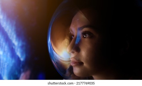 Concept: space expedition. Portrait Female astronaut in space on planet orbit                                - Shutterstock ID 2177769035