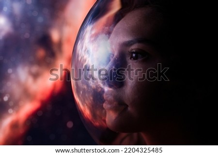 Concept: space expedition. Portrait Female astronaut in space on planet orbit                              
