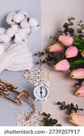 The concept of the spring equinox, the time between snow and flowers vertical view