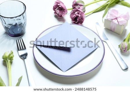 Similar – Image, Stock Photo Elegant spring table setting with nest and eggs