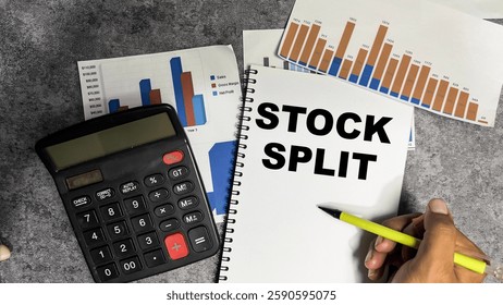 Concept of Stock Split write on book isolated on Wooden Table.