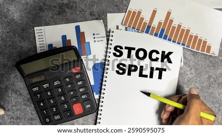 Concept of Stock Split write on book isolated on Wooden Table.