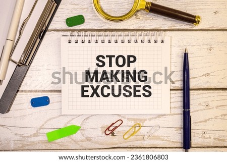 Concept of Stop Making Excuse write on a book isolated on Wooden Table. Selective focus on Stop Making Excuse text.