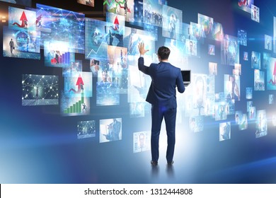 Concept of streaming video with businessman - Shutterstock ID 1312444808