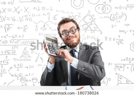 Concept of success with happy nerd businessman with calculator