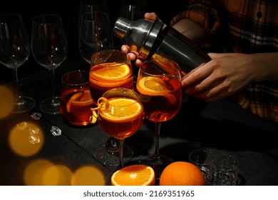 Concept Of Summer Alcohol Drink, Female Bartender Making Aperol Spritz