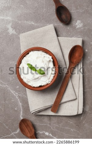 Concept of tasty dairy product - ricotta cheese, top view