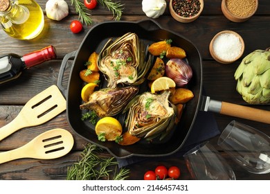 Concept of tasty food with grilled artichoke, top view