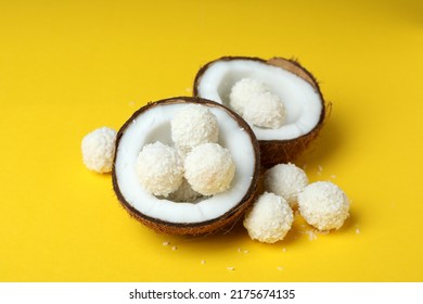 Concept of tasty sweets on yellow background, coconut candies - Shutterstock ID 2175674135