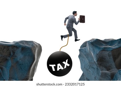 Concept of tax burden with businessman over chasm - Shutterstock ID 2332017125
