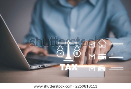 Concept TAX-2023 and refund tax of duty taxation business, graphs, and chart being demonstrated on the screen media, App for selecting tax refund, Keeping track of annual tax expenditures