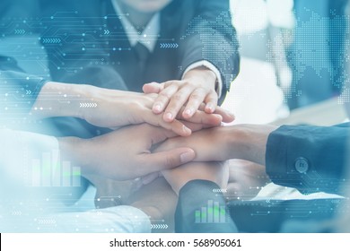Concept of teamwork. business people joined hands - Shutterstock ID 568905061