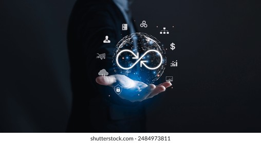 Concept of technology data link and virtual Global Internet connection. Businessman's hand holding infinity with icon show digital link technology.digital marketing or global network system,Big Data.