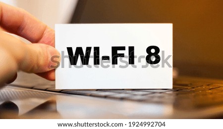 Concept with technology wifi 8, user holds on paper in hands