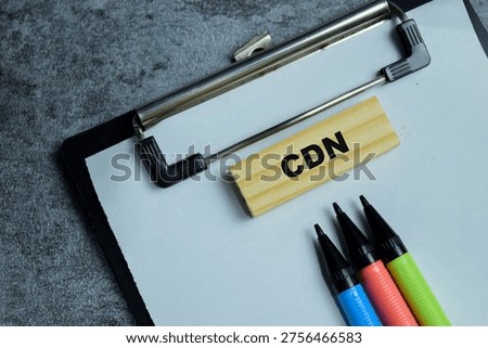 Concept of text CDN - Content Delivery Network on wooden blocks.