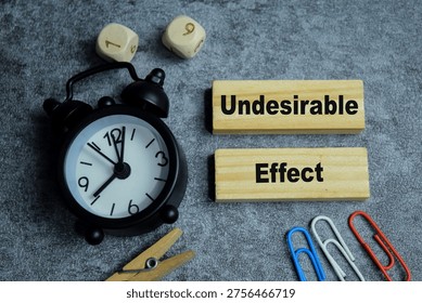 Concept of text undesirable effect on wooden blocks.