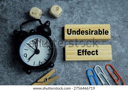 Concept of text undesirable effect on wooden blocks.