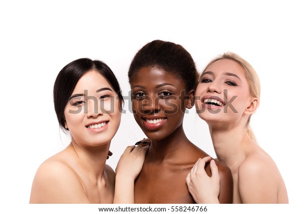Concept Of Three Different Ethnicity Of Women Being Very Close One To Each Other And Looking