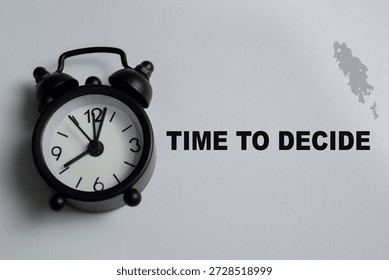 Concept of time to decide write on book isolated on Wooden Table. Representing decision making, deadline pressure, and time management