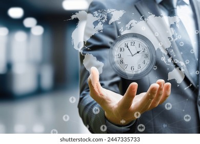 The concept of time management in business process. Businessman holding a wall clock against the background of a world map. - Powered by Shutterstock - Get 15% off with code: PIKWIZARD15