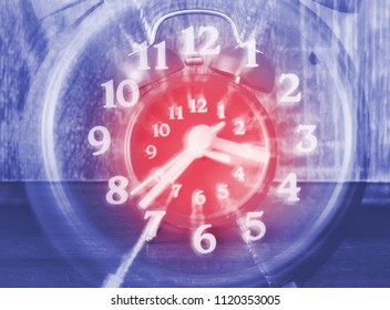 Concept Of Time Passing On A Analog Clock With Blurred Zoom Effect. Fast Time Passing, Life Time Goes Fast.