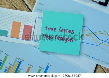 Concept of Time Series Data Analysis write on sticky notes isolated on Wooden Table.