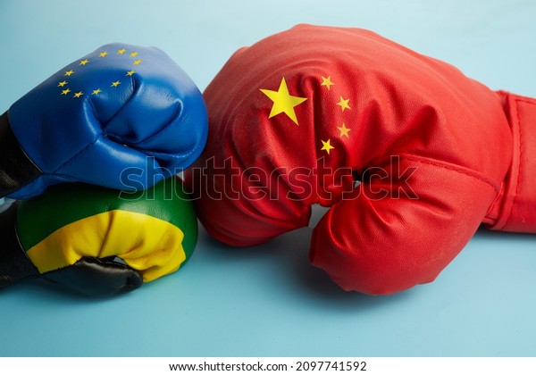 Concept of trade\
war. China Lithuania and EU politics relationship partnership\
divided conflicts\
concept