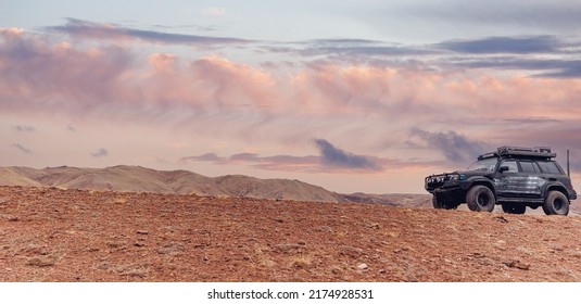 Concept travel offroad with car 4x4 mountains Altai Mars valley or sand Gobbi Mongolia. - Powered by Shutterstock