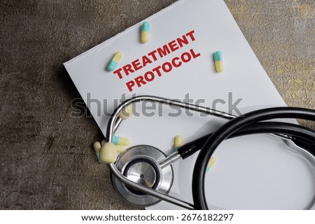 Concept of Treatment Protocol write on book isolated on Wooden Table.