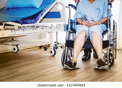 Concept Of Treatment And Rehabilitation : Elderly Patients In Wheelchairs Due To Hemiparesis Treatment In The Hospital With A Doctor Closely.


