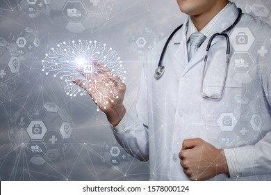 The Concept Of The Use Of Artificial Intelligence In Medicine. The Doctor Clicks On The Artificial Brain.