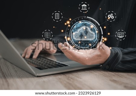 Concept of using cloud computing to store data : Business man holding are using cloud computing to store important data such as big data , financial and banking , digital marketing by global internet