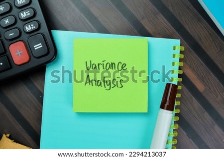 Concept of Variance Analysis write on sticky notes isolated on Wooden Table.