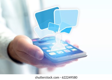 Concept view of professional network with contact icon over smartphone - Shutterstock ID 622249580