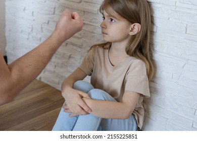 The Concept Of Violence And Abuse In The Family. Father Punishing His Child.