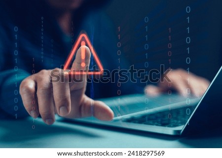Concept of warning or alert, technology scam, user showing warning of access to software, virus, malicious cyber attack or online network hacking threat, technology security with virtual graphics.