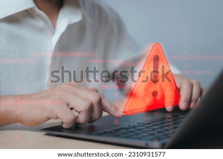 concept, warning or notification, technology fraud, user showing warning access to malicious cyber attack virus software or threat to hack online network, technology security with laptop computer.