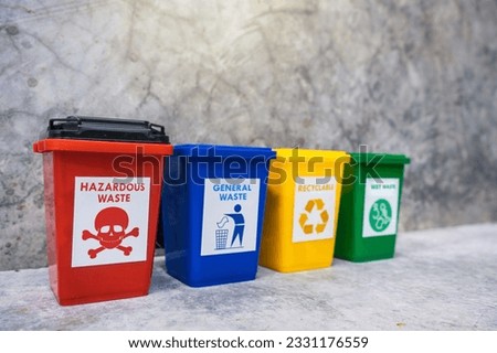 The concept of waste classification for recycling. Collection of bins for different types of garbage by separation according to the color of the bin with old wall background. Foto stock © 